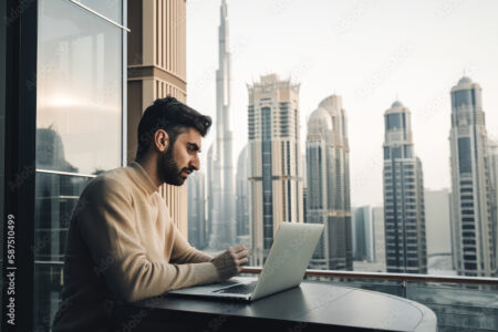 Arab man using a laptop in Dubai. High quality generative ai